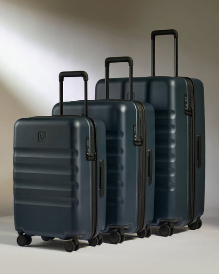 Icon Stripe Set with Biggest Carry-On in Indigo Blue