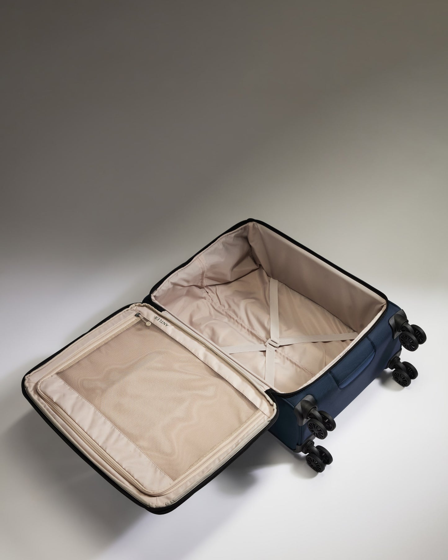 Lightest Medium Luggage in Indigo Blue - Soft Stripe 2.0