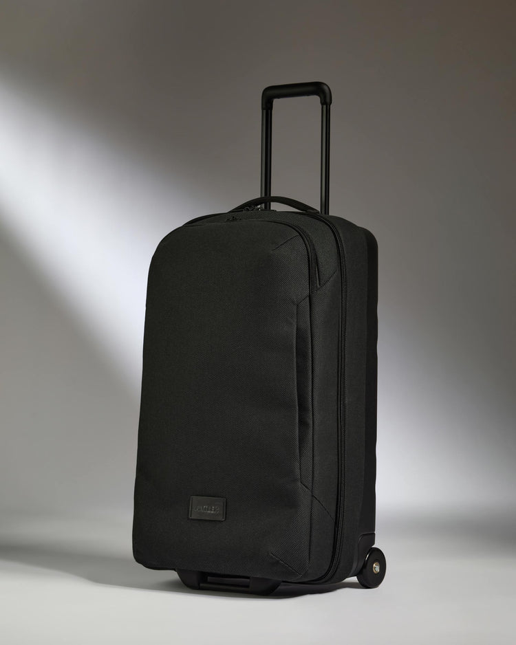 a black suitcase with wheels