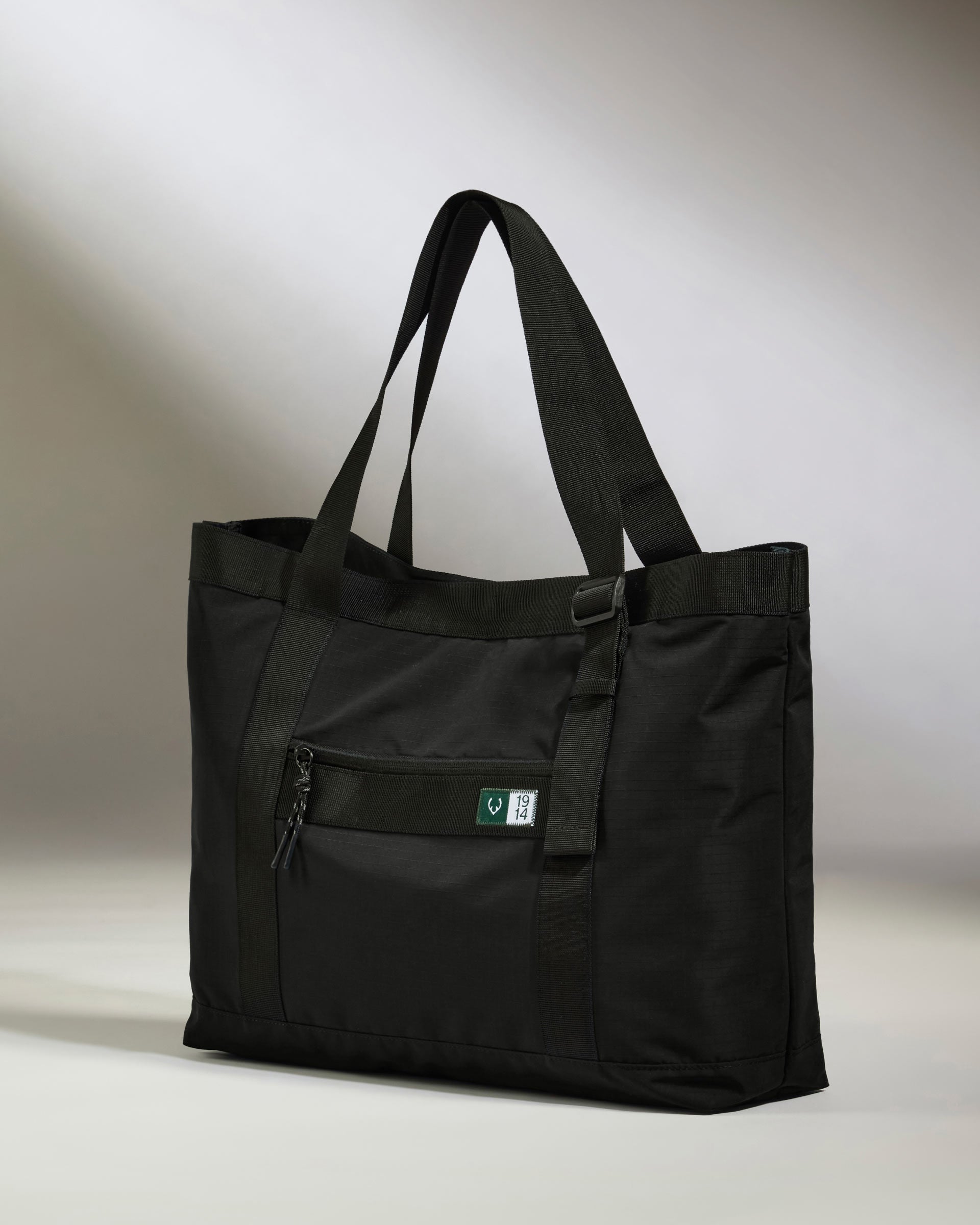 black nylon travel tote bag James Its the rugged little buddy that helps you to assemble a picnic Voyage Nylon Travel Tote in