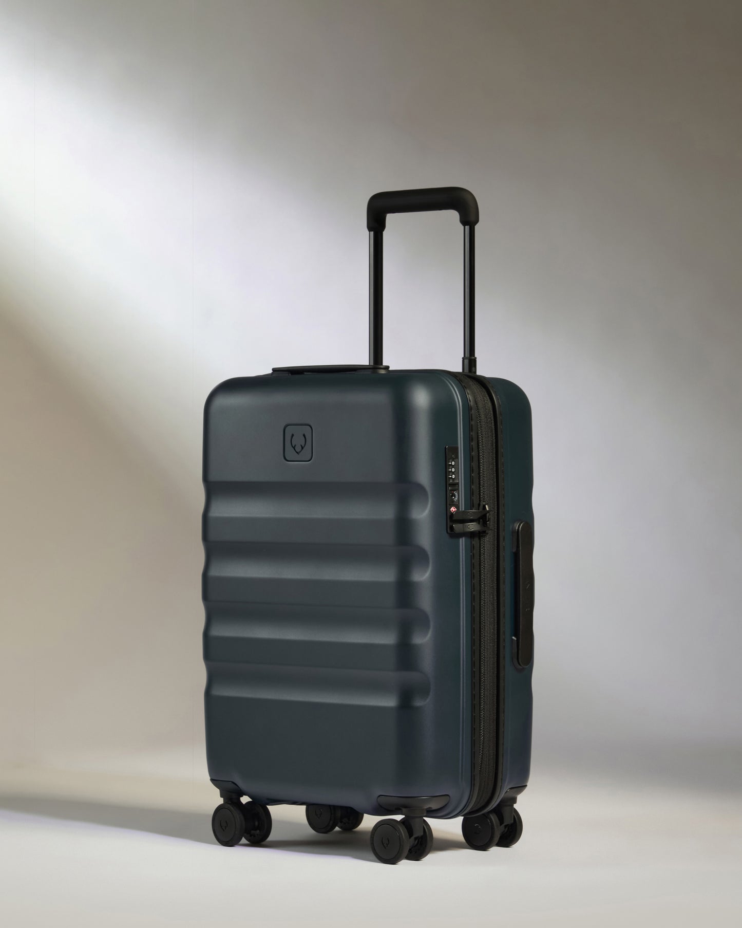 Icon Stripe Carry-On with Expander in Indigo Blue