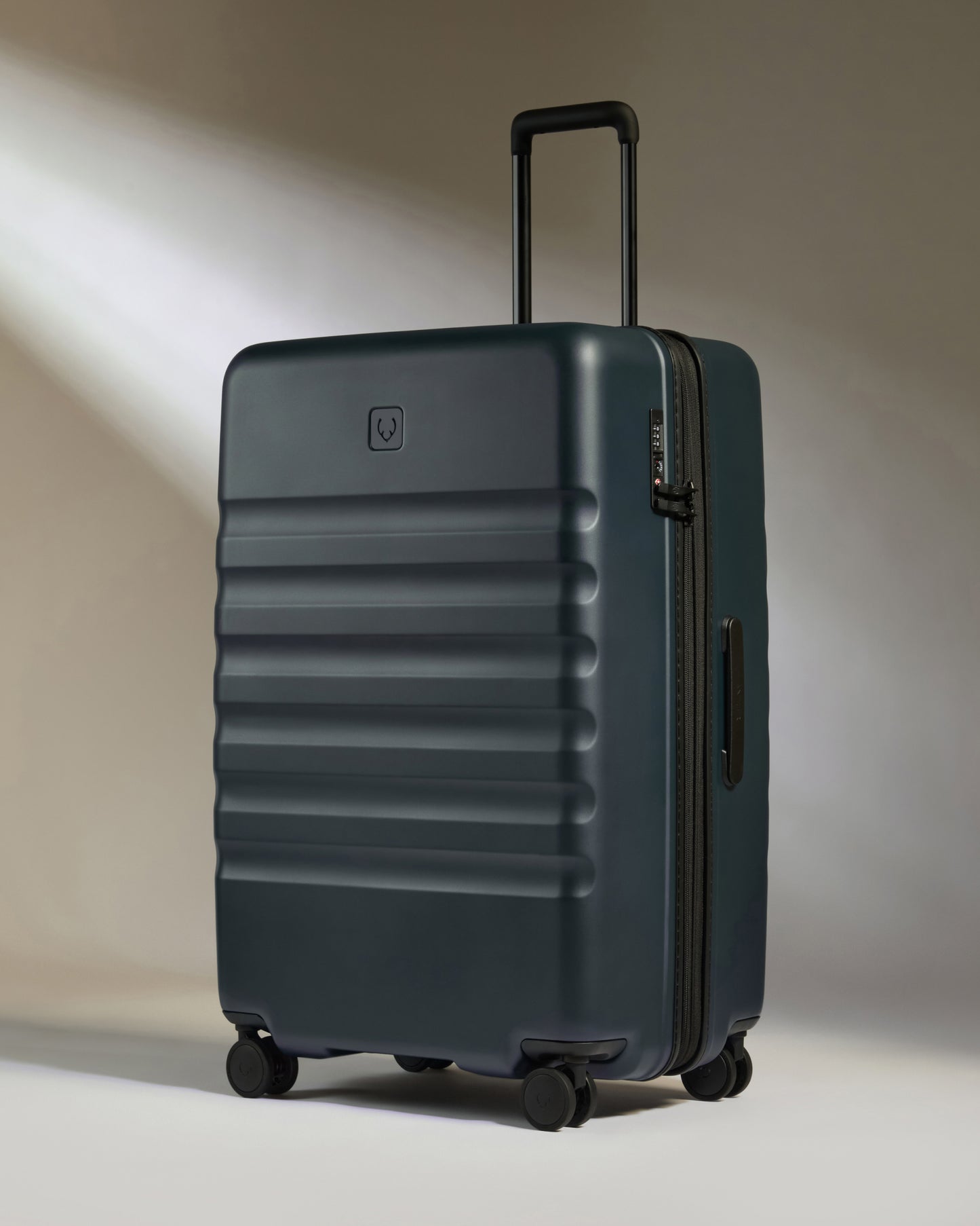 Icon Stripe Set with Biggest Carry-On in Indigo Blue