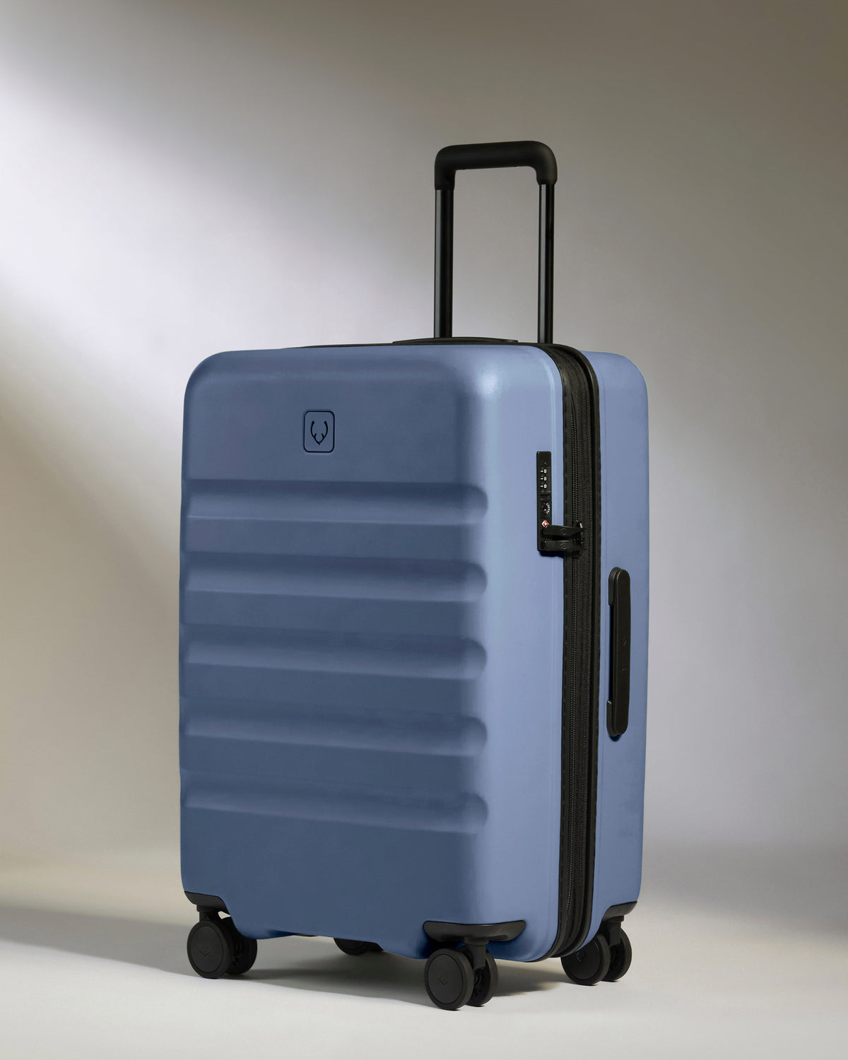Medium Luggage in Ocean Blue - Icon Stripe