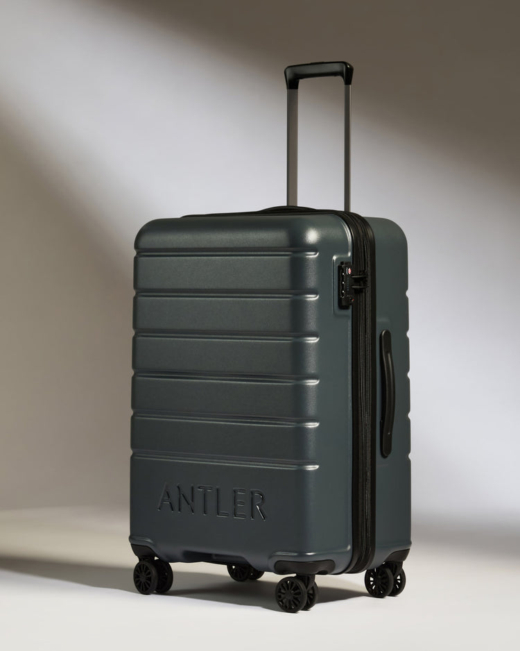 Medium Luggage in Granite Gray - Logo