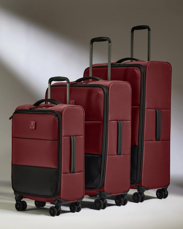 a group of luggage on wheels