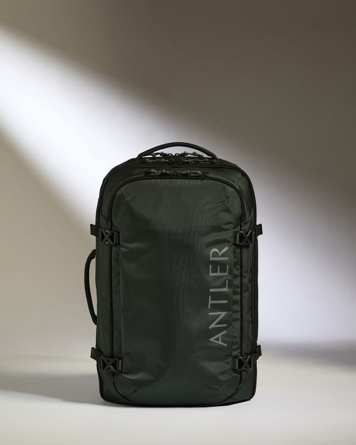 60 liter travel backpack Discovery 60L Hybrid Duffle in Dark Forest Green while internal webbing straps Color:Albino Frog WC Alexander Wang Wallie Leather