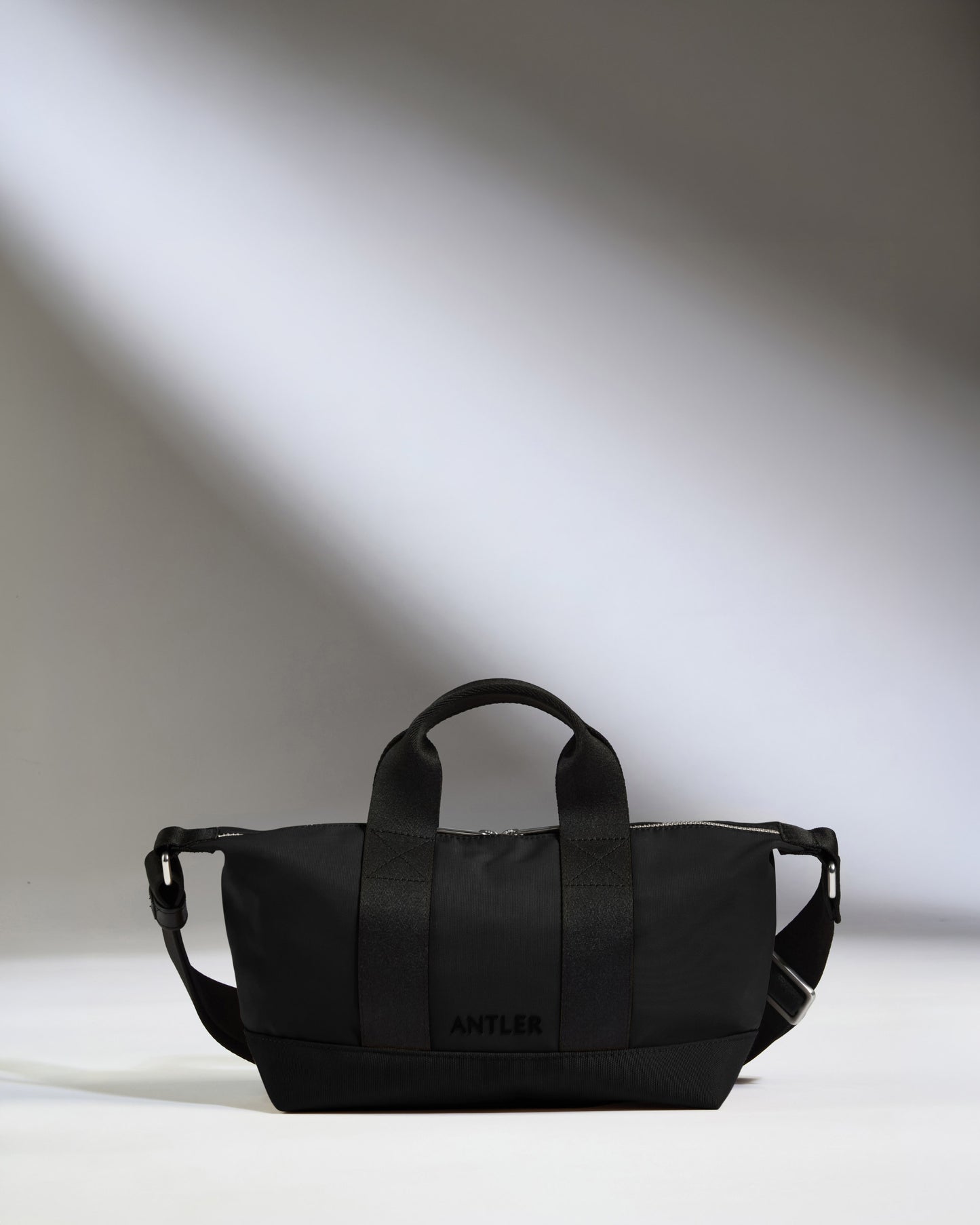 Icon Mini Crossbody Bag in Black
