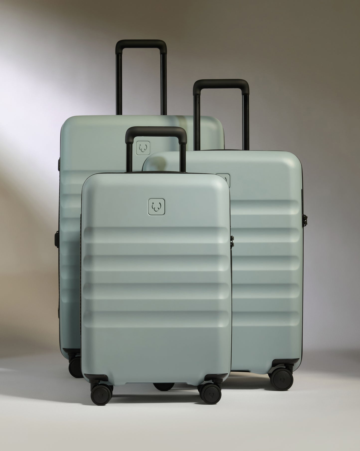 Icon Stripe Set with Biggest Carry-On in Mist Blue