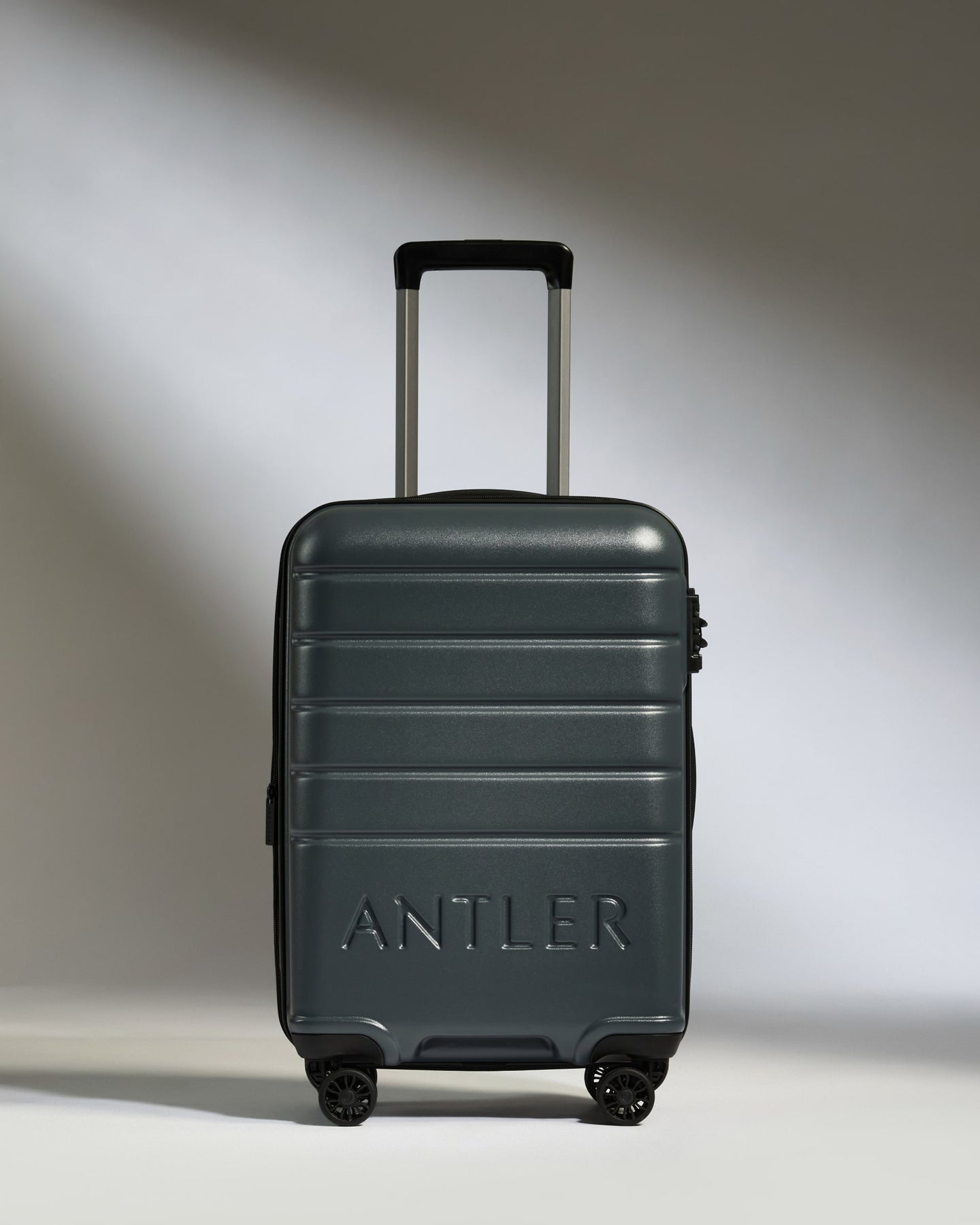 Expandable Carry-on Luggage in Granite Gray - Logo
