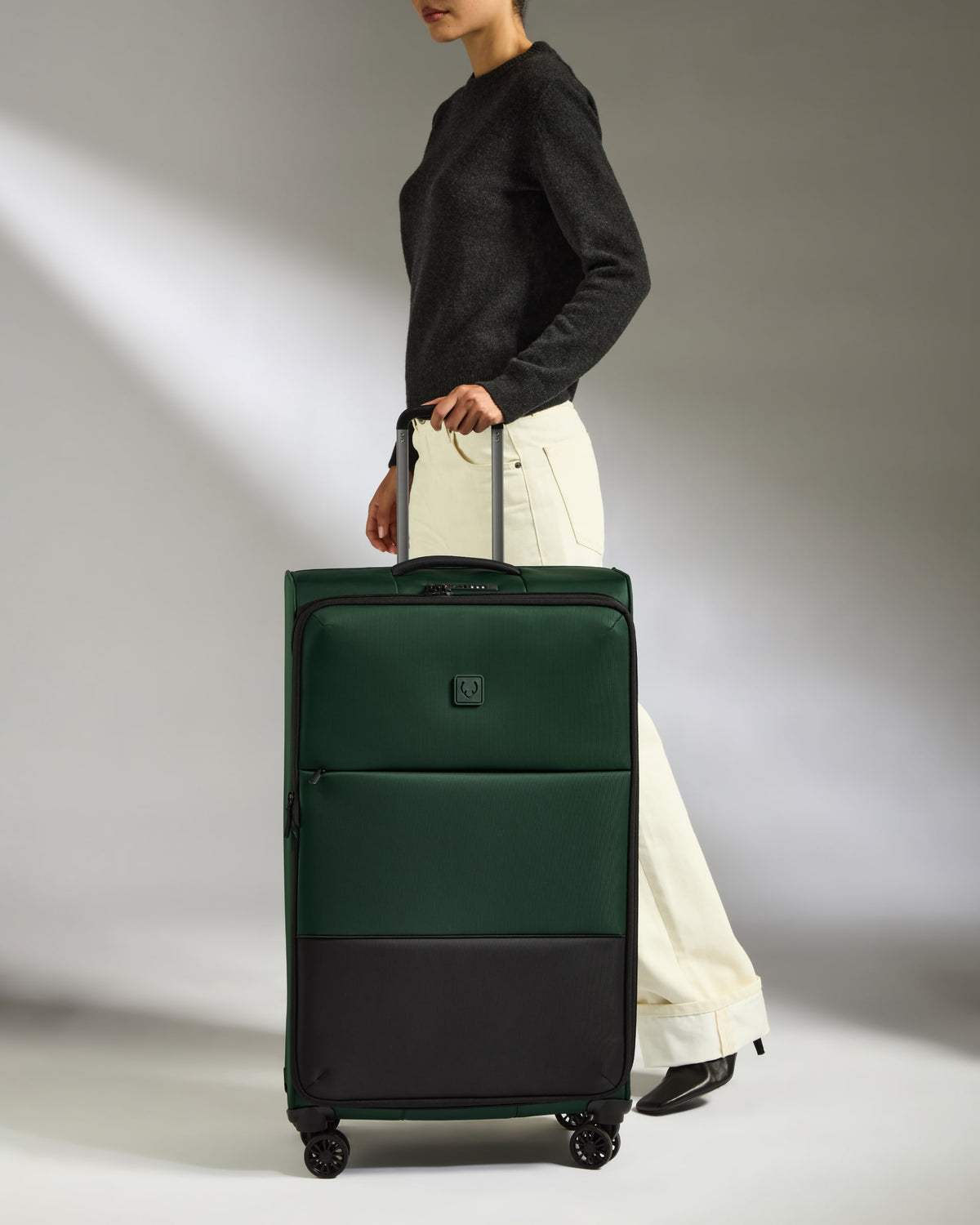 a woman holding a suitcase