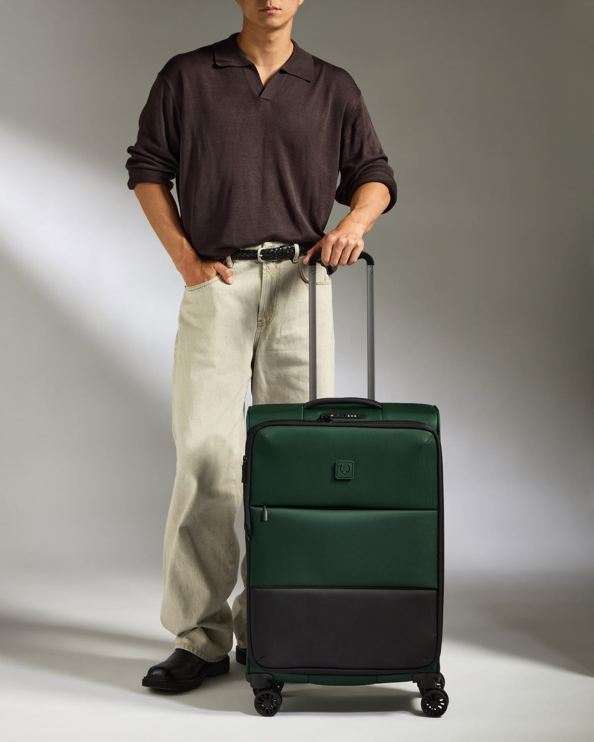 a man standing with his luggage