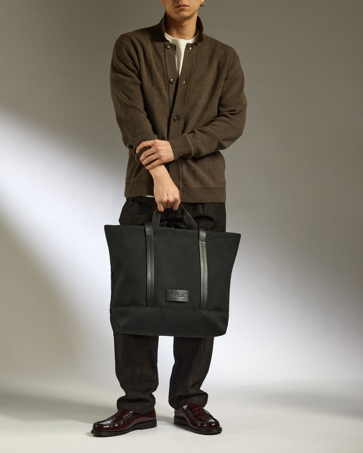 a man holding a bag
