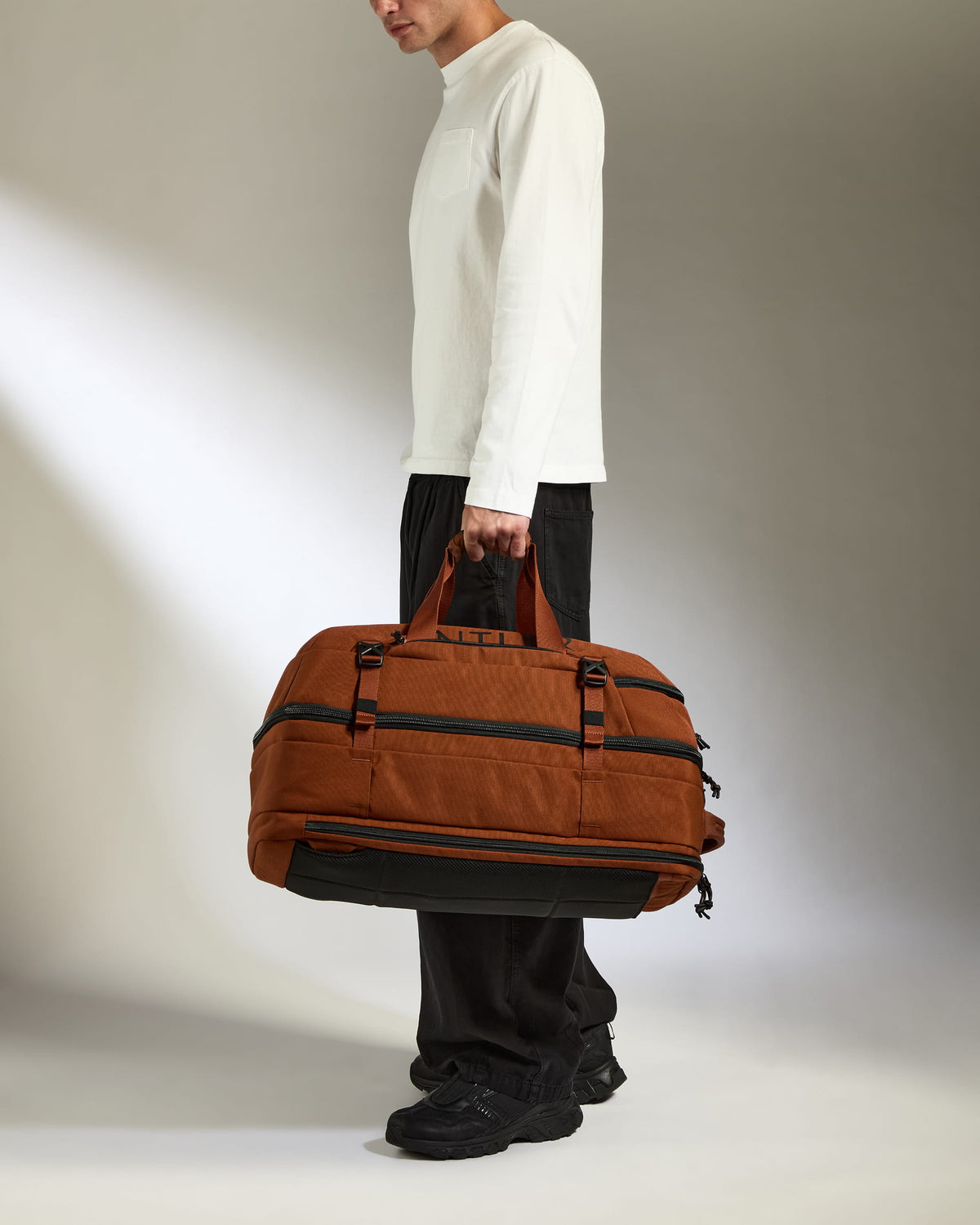 Discovery 60L Hybrid Duffle Backpack in Clay Brown