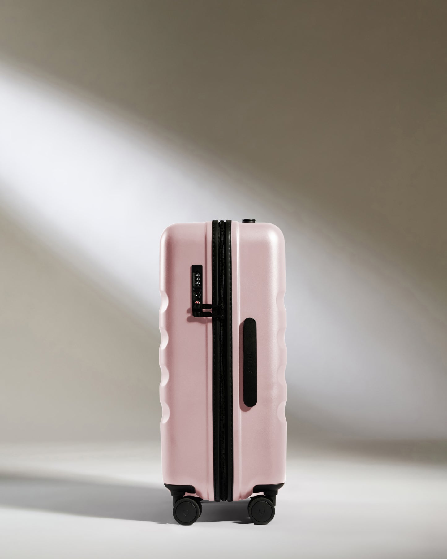 Icon Stripe Biggest Carry-On in Moorland Pink