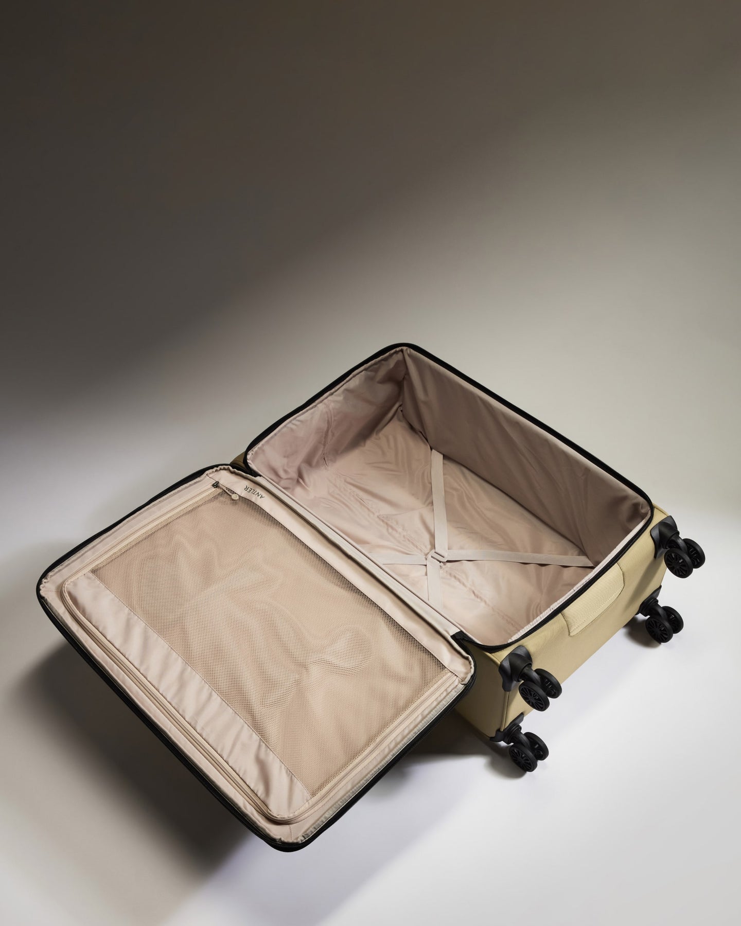 Lightest Large Luggage in Sand - Soft Stripe 2.0