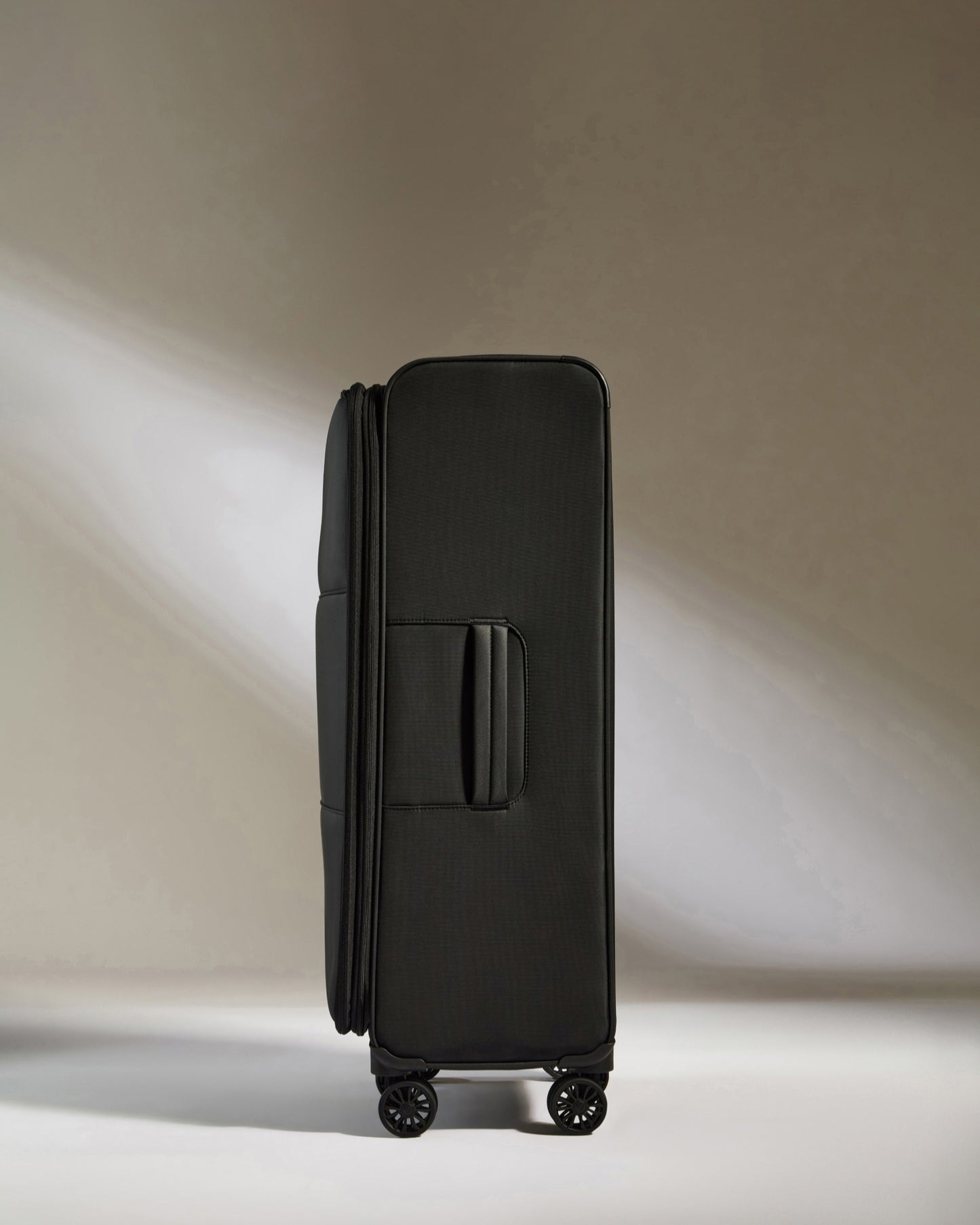 Lightest Large Luggage in Black - Soft Stripe