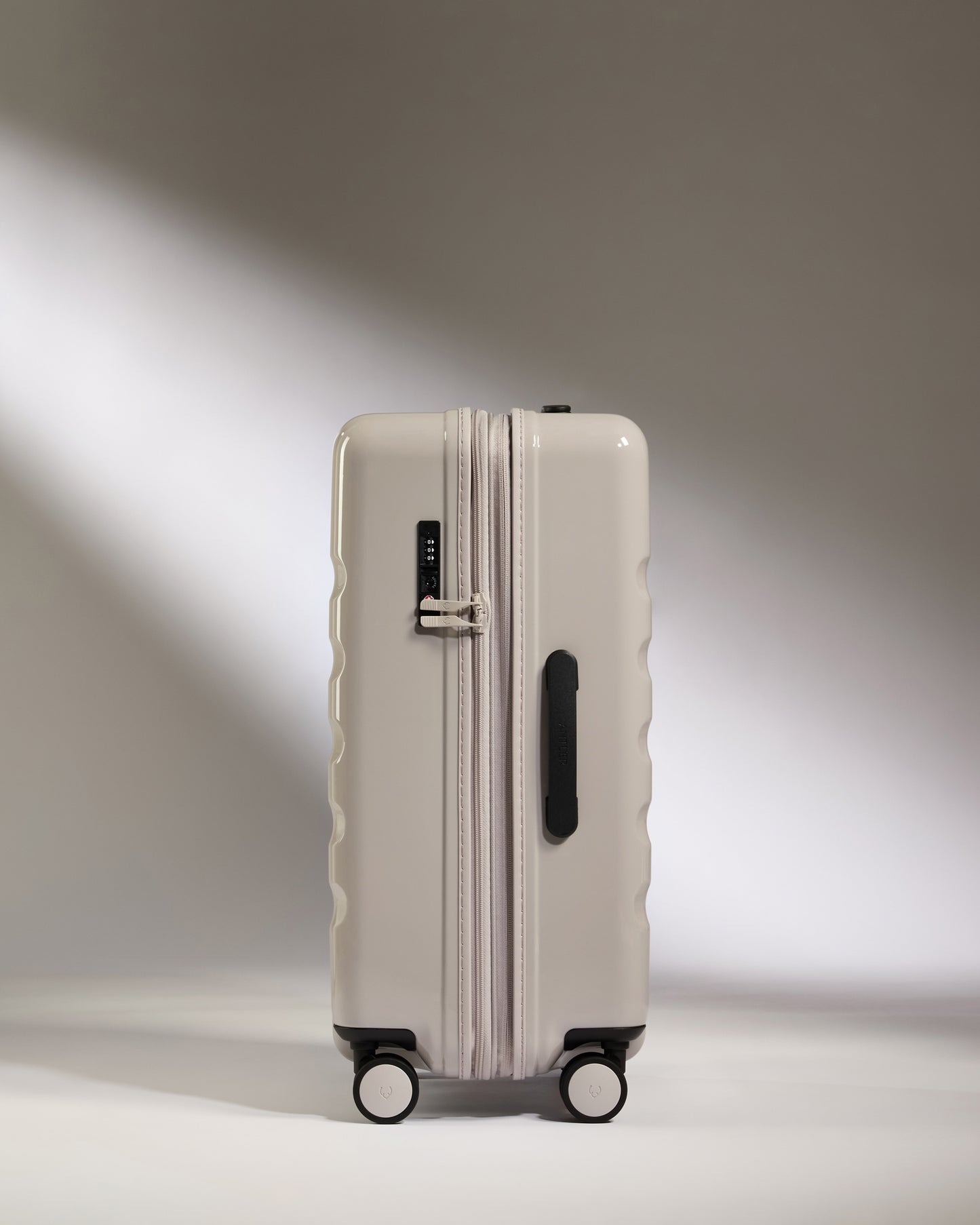 Medium Luggage in Taupe Gloss - Icon Stripe
