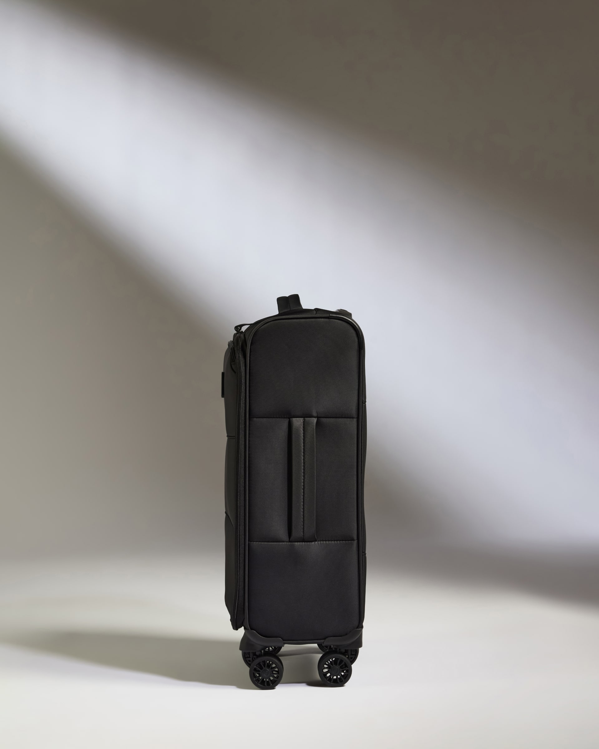 a black suitcase with wheels