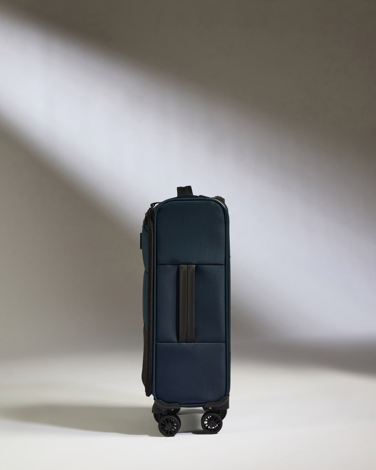 a blue suitcase with wheels