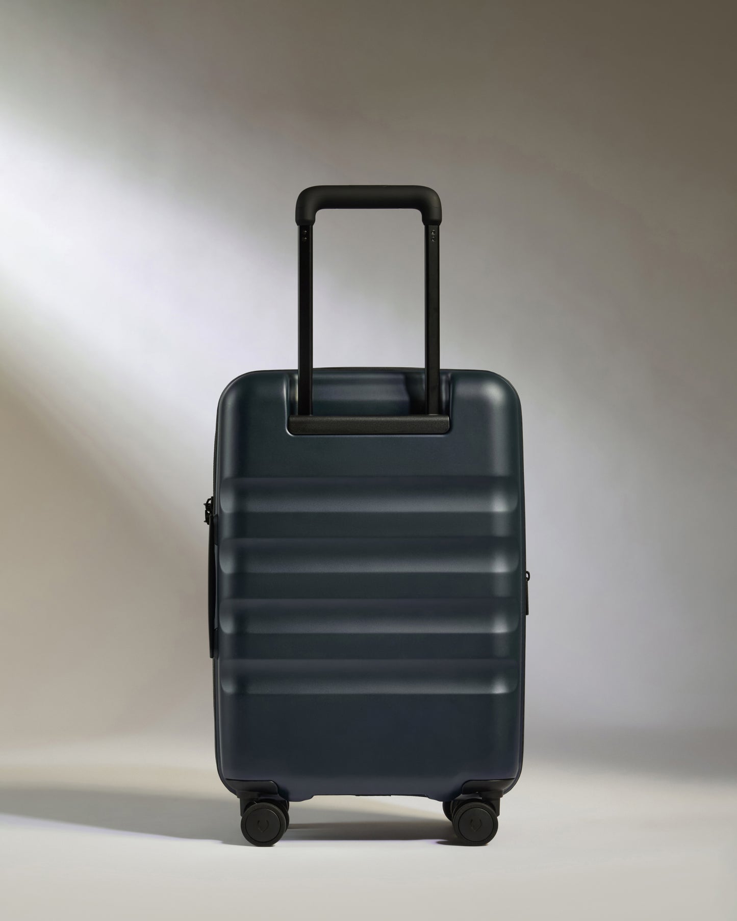 Icon Stripe Carry-On with Expander in Indigo Blue