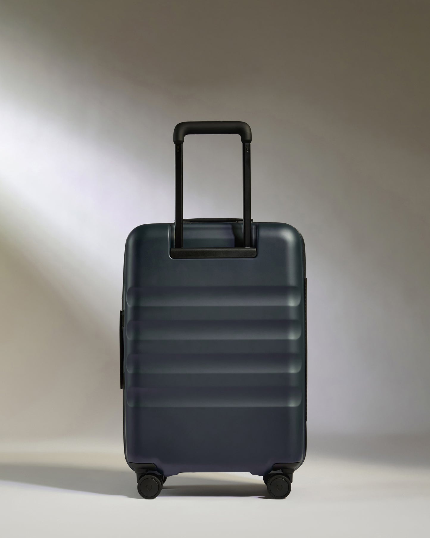 Icon Stripe Biggest Carry-On in Indigo Blue