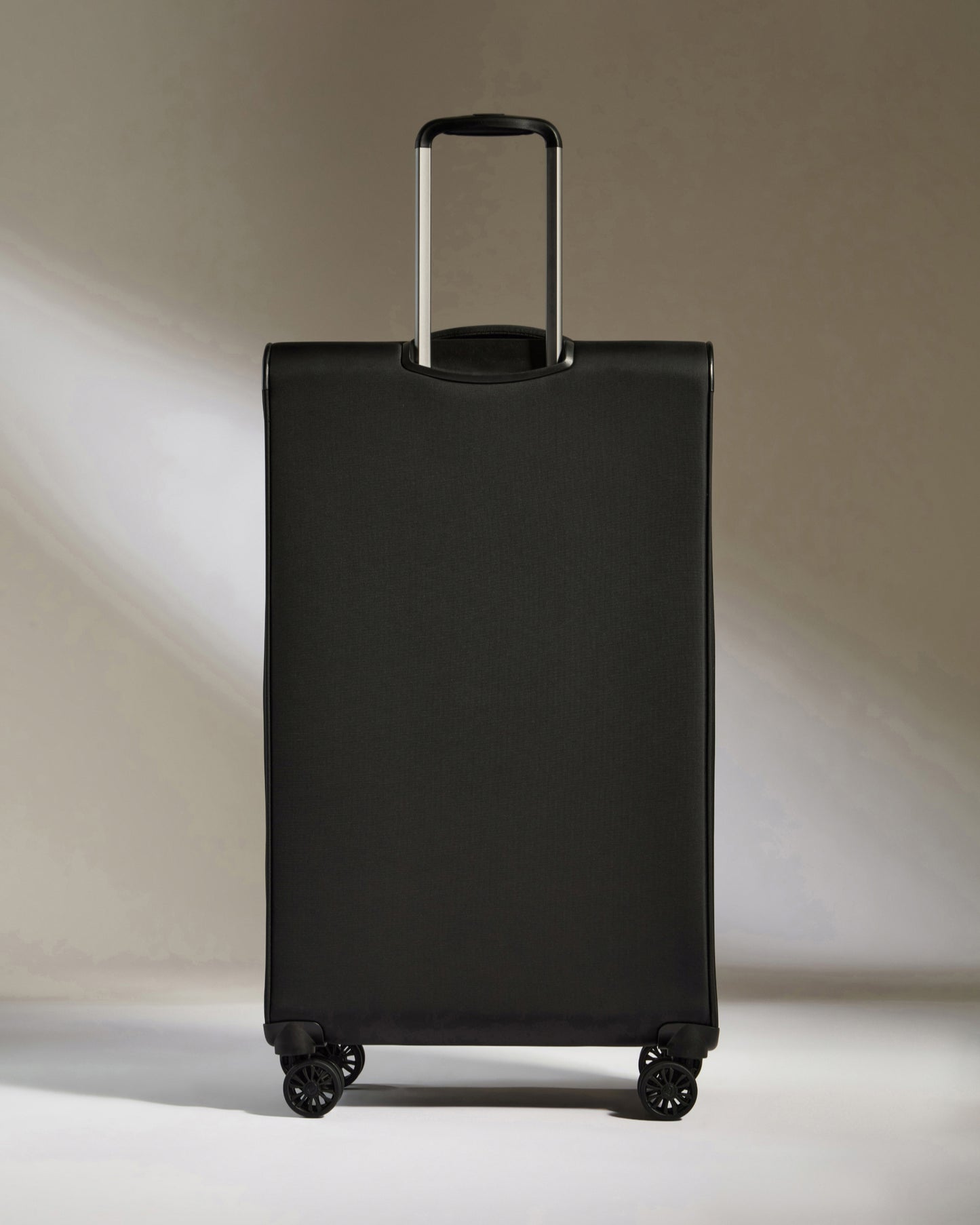 Lightest Large Luggage in Black - Soft Stripe
