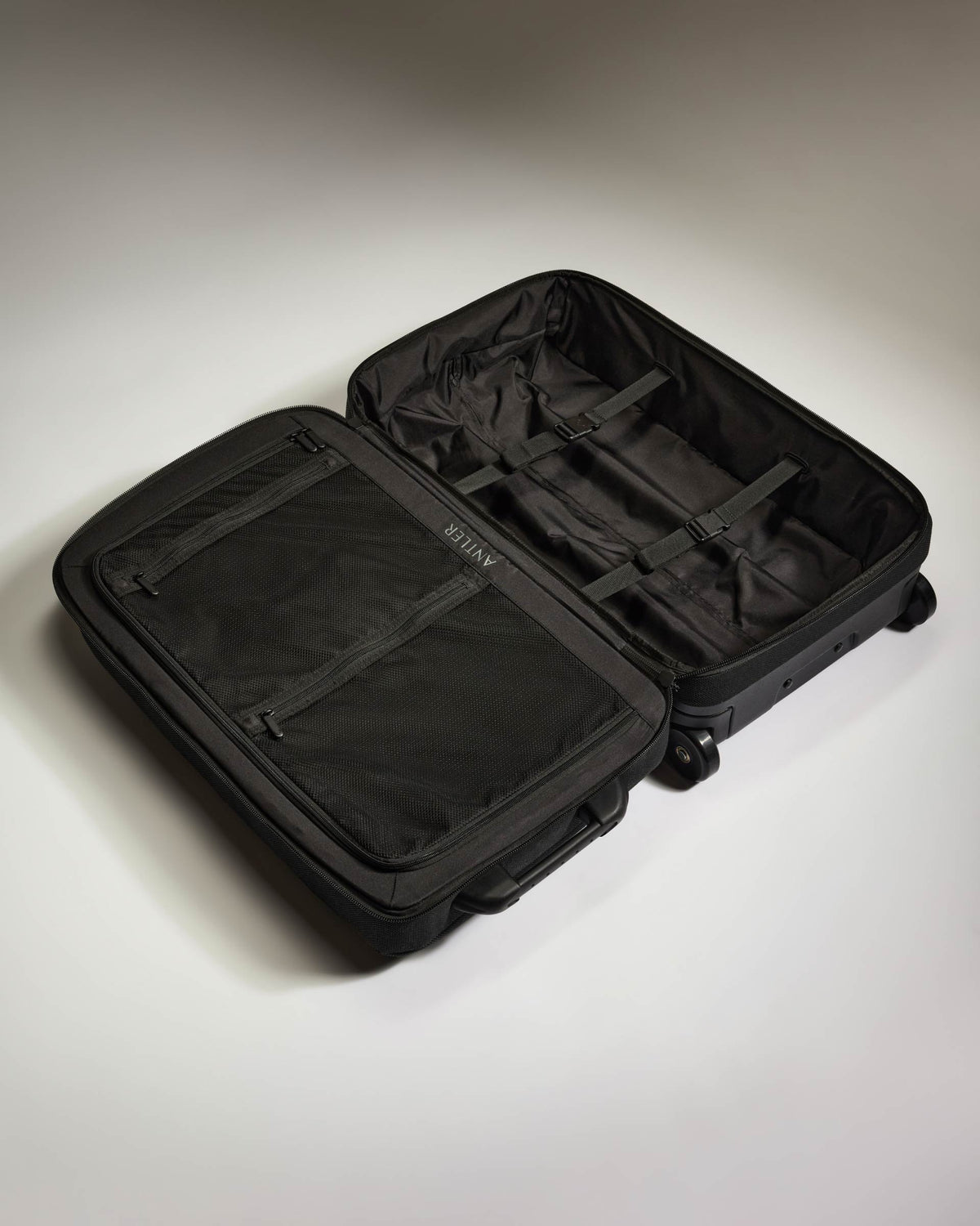 Antler Weave Wheeled Duffel in Black