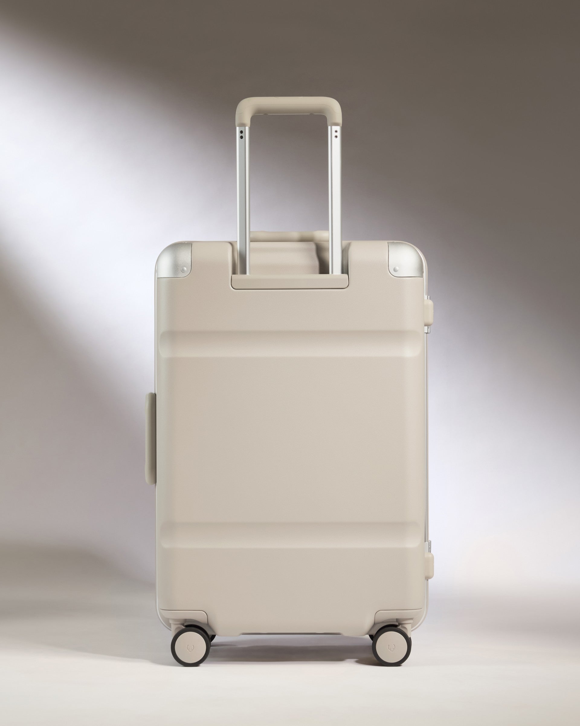 a white suitcase with wheels