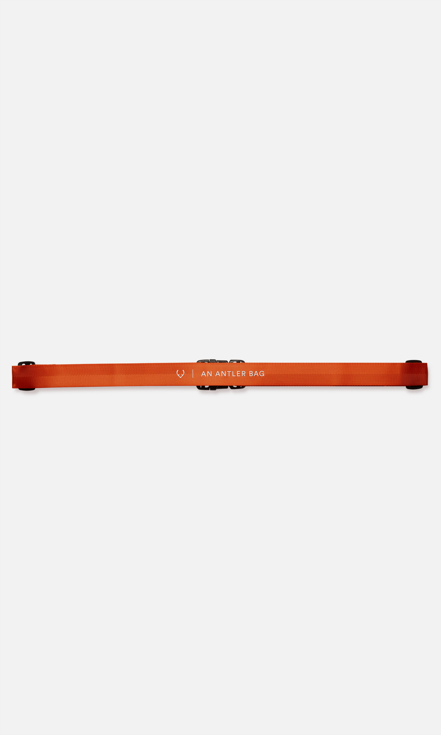 Luggage strap in coral