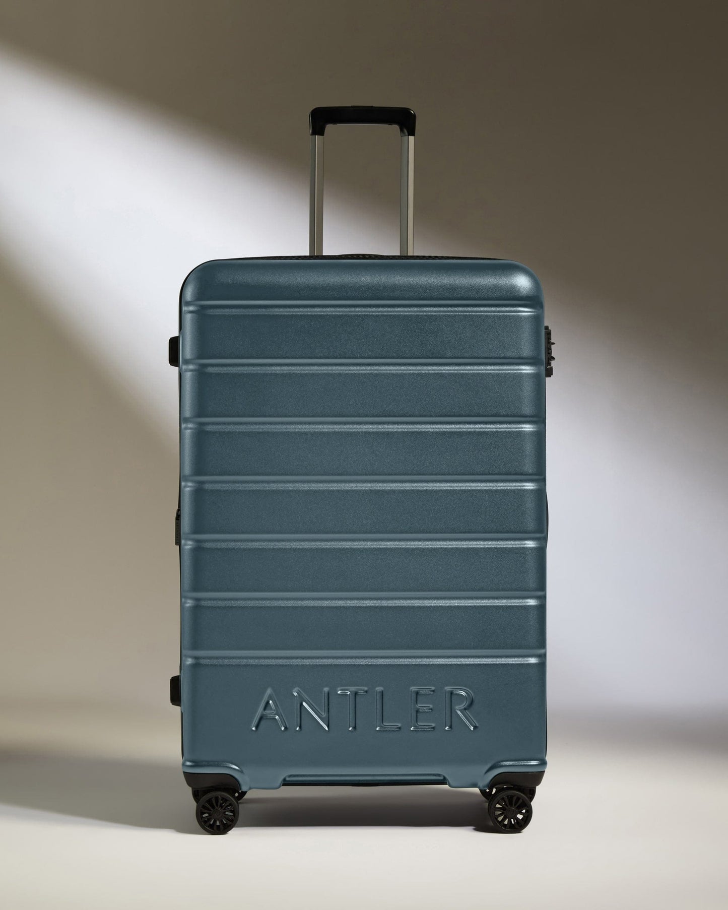 Large Luggage in Blue Gray - Logo