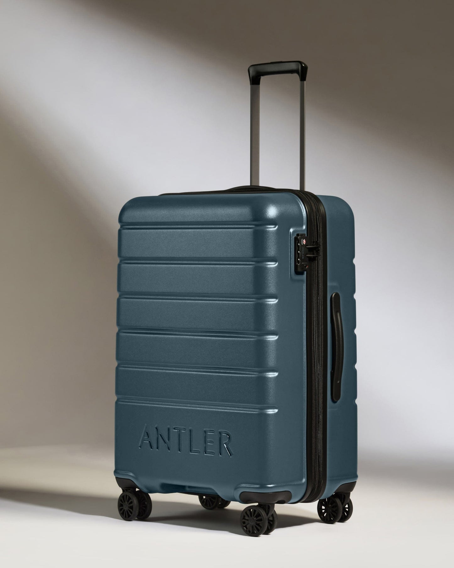 Medium Luggage in Blue Gray - Logo