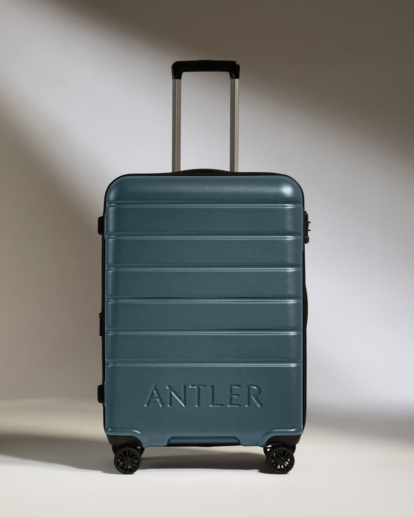 Medium Luggage in Blue Gray - Logo
